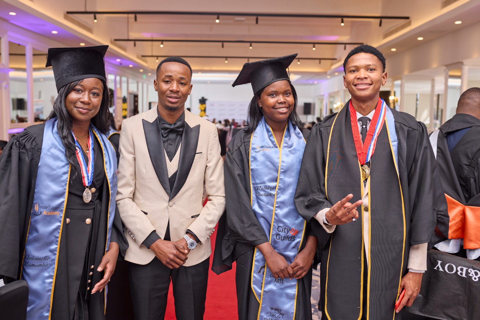 Students celebrating graduation success