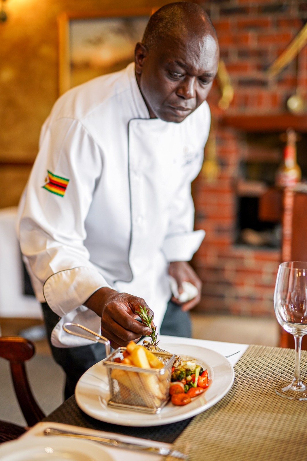 Master Chef Leonard Moyo with a proud graduate